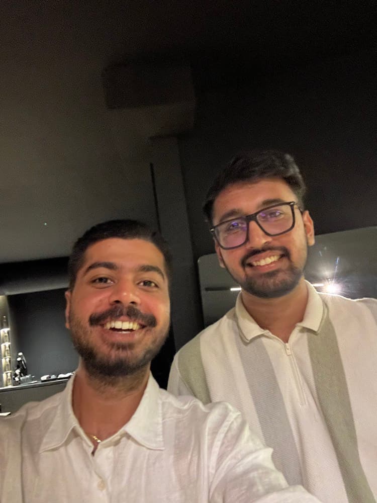anirudh and hitesh smiling in a selfie in dubai